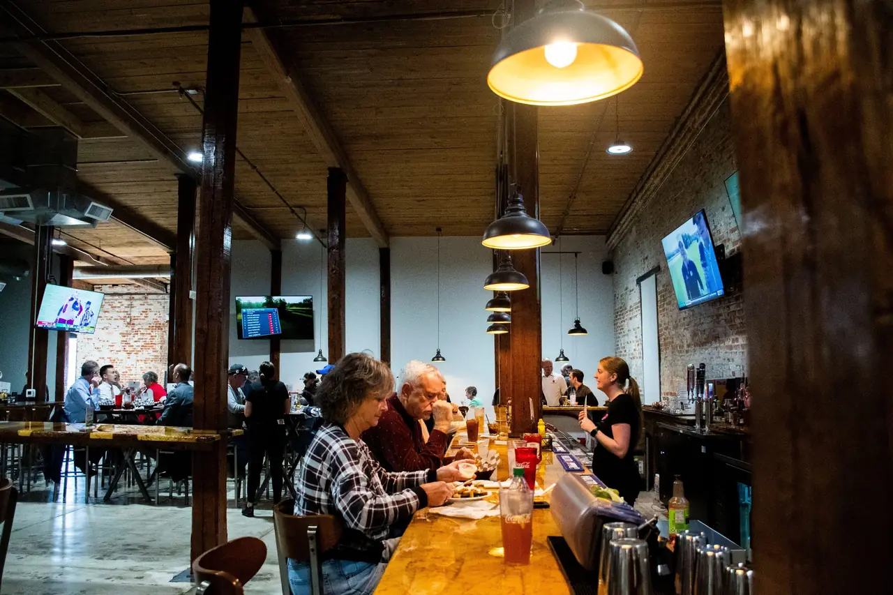 The bar at River District Social